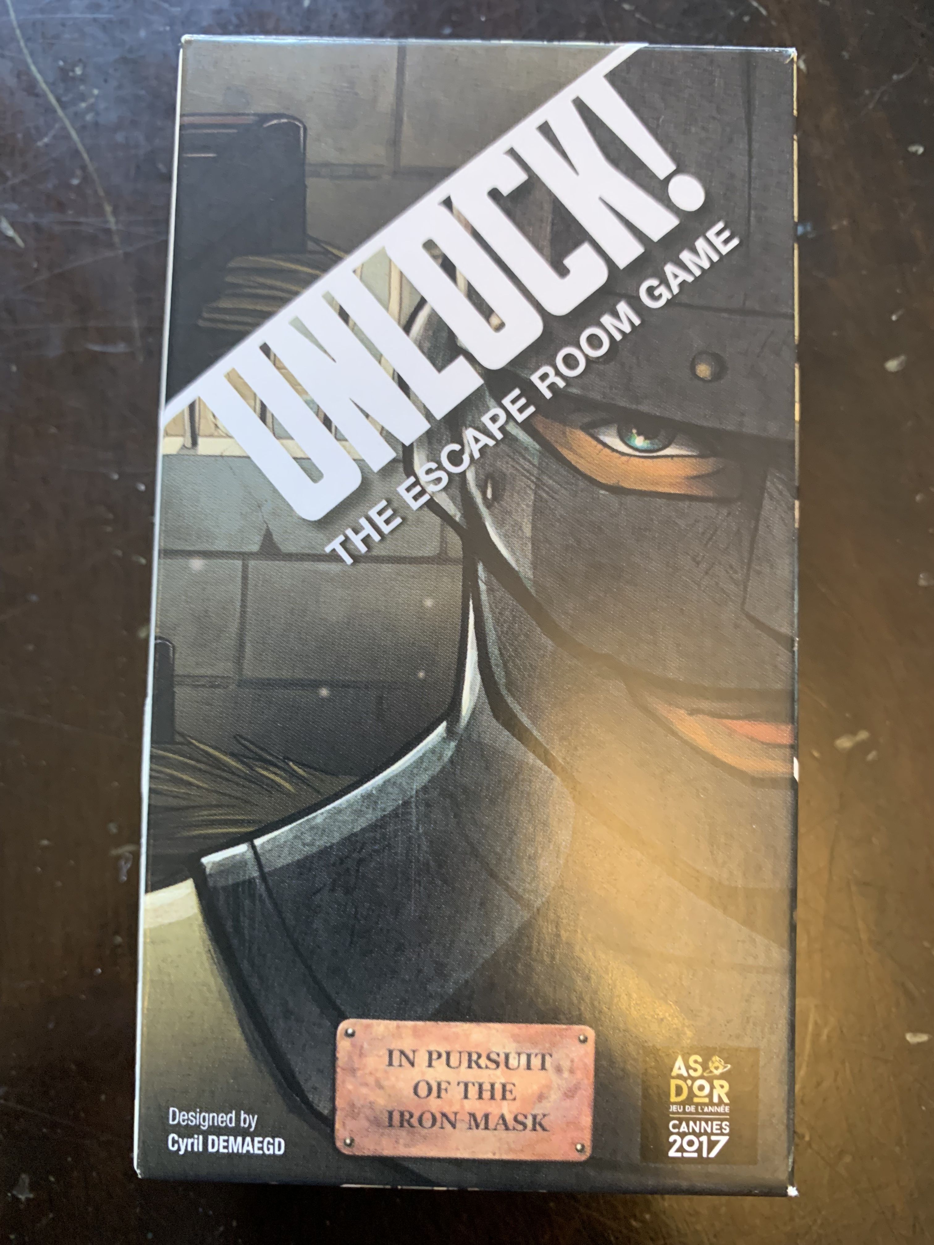 Unlock!: The Escape Room Game – In Pursuit of the Iron Mask box art