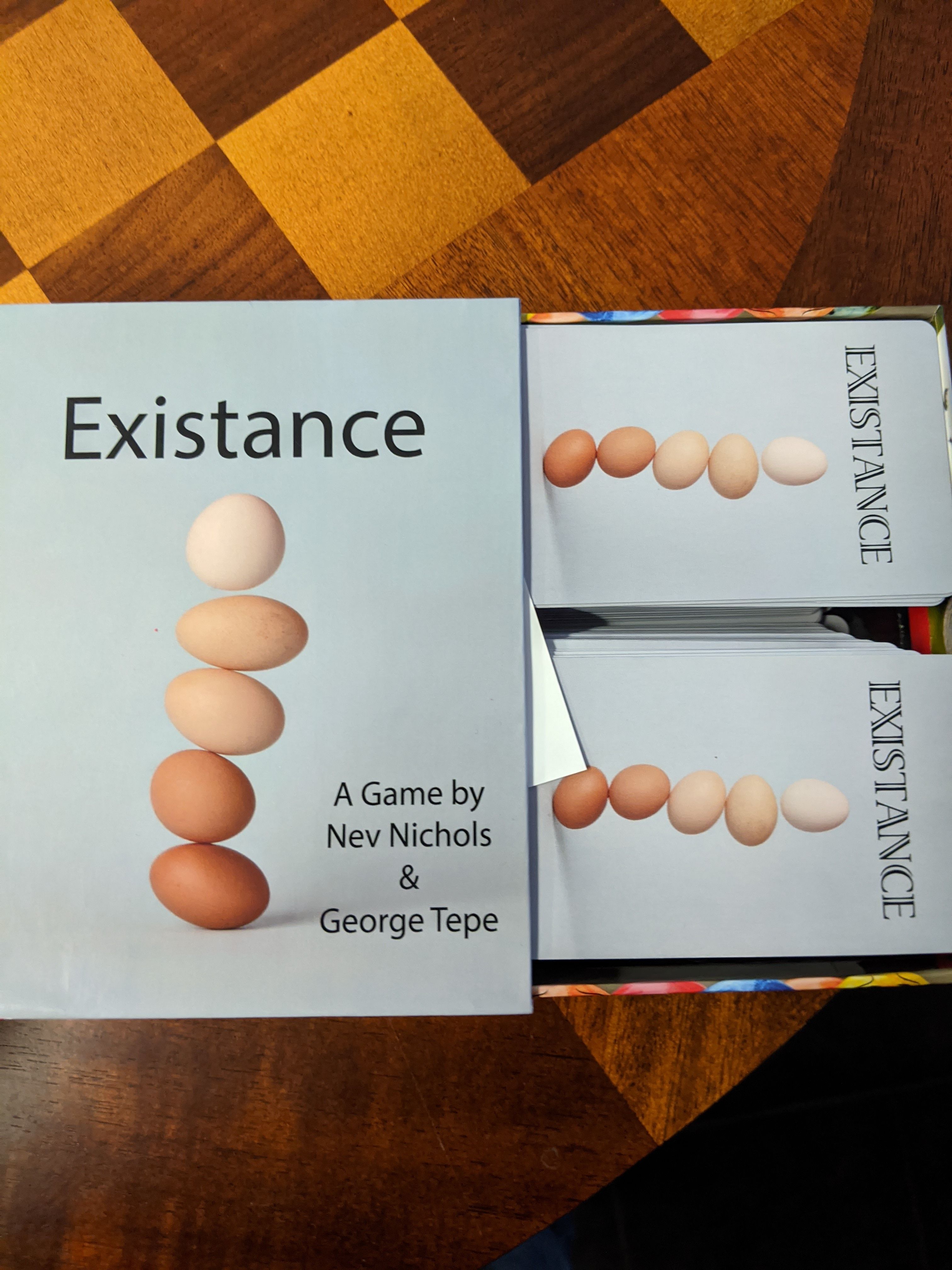Existance Card game box art