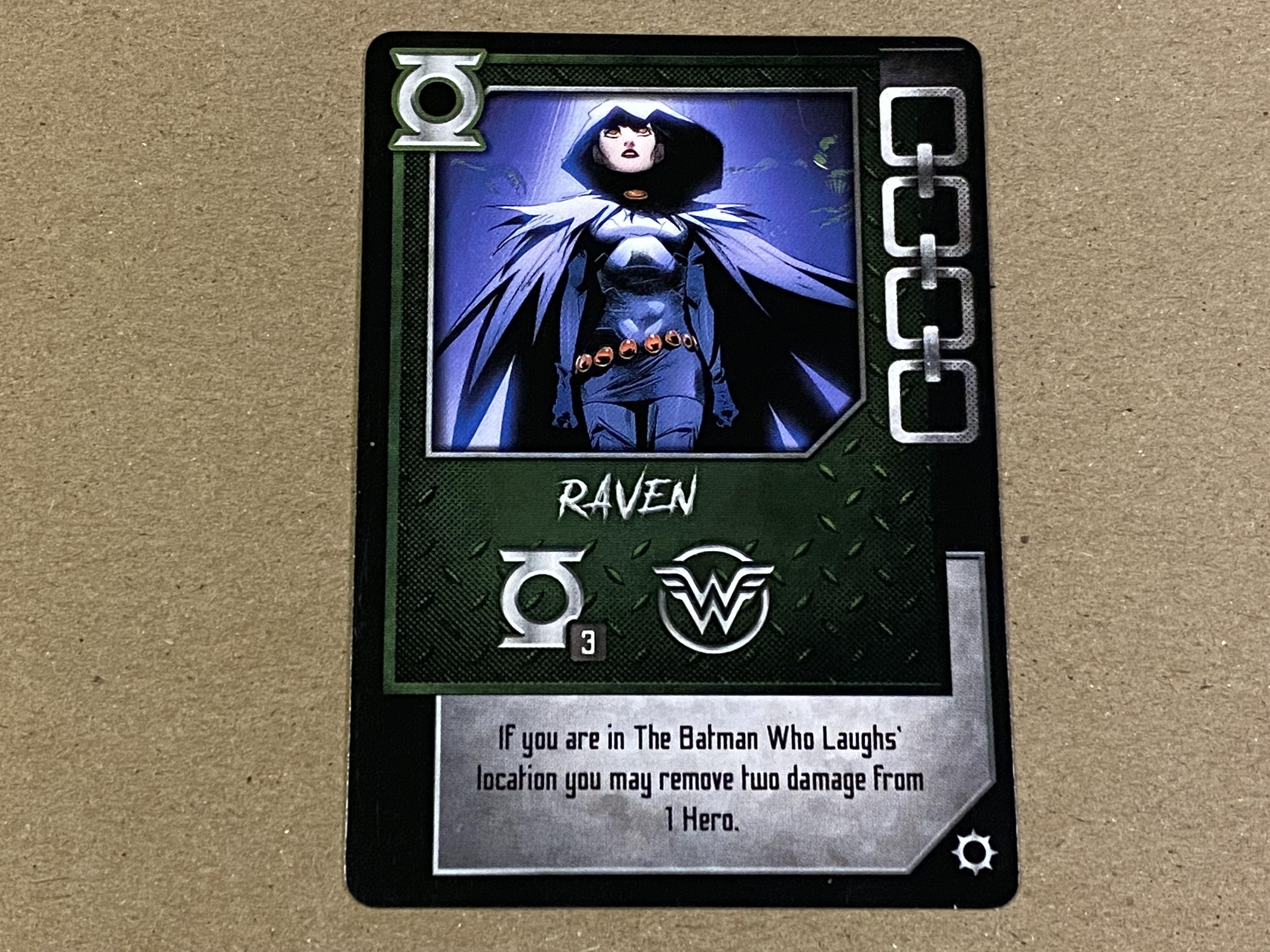 The Batman Who Laughs Rising: Raven Promo Card doboz