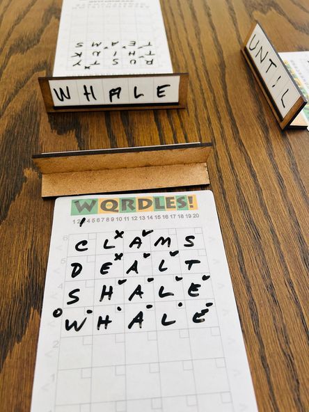 Coperta WQRDLES: A Tactile Wordle-Like Multi-Player Word Deduction Game