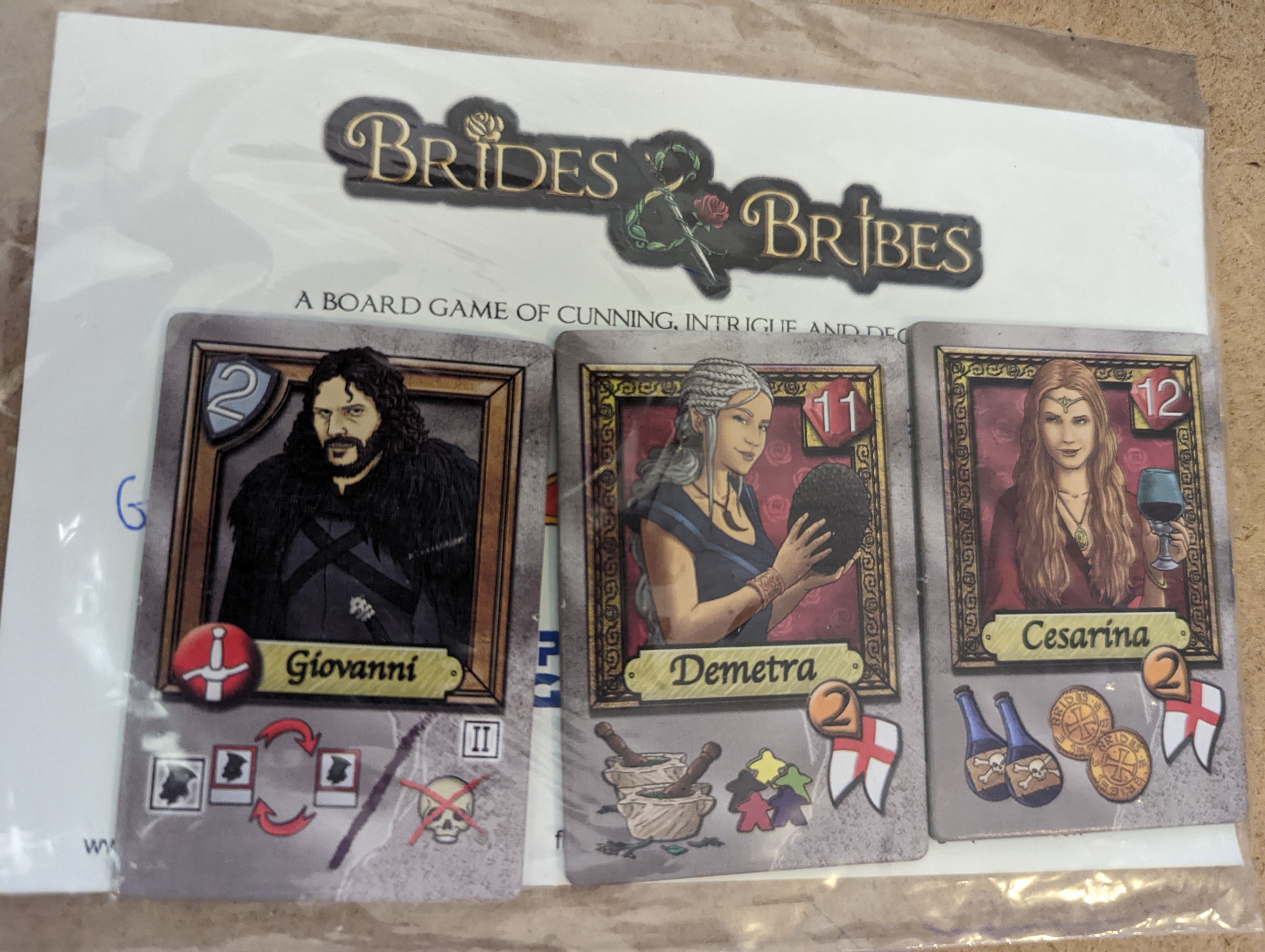 Brides & Bribes: Kickstarter Exclusive Promos box art